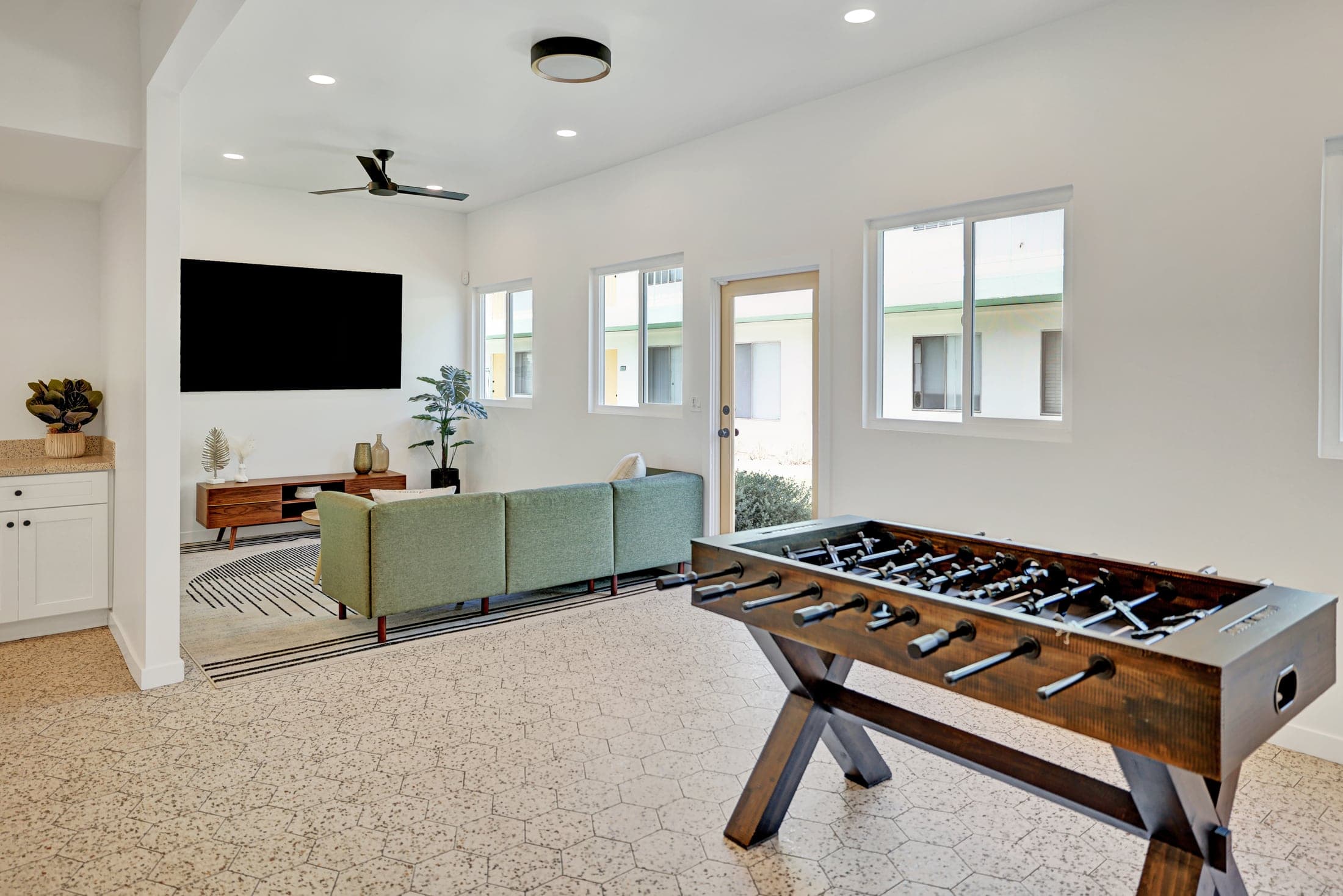Paloma shared resident lounge with seating and a foosball table